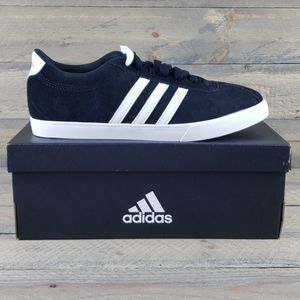 white adidas black stripes